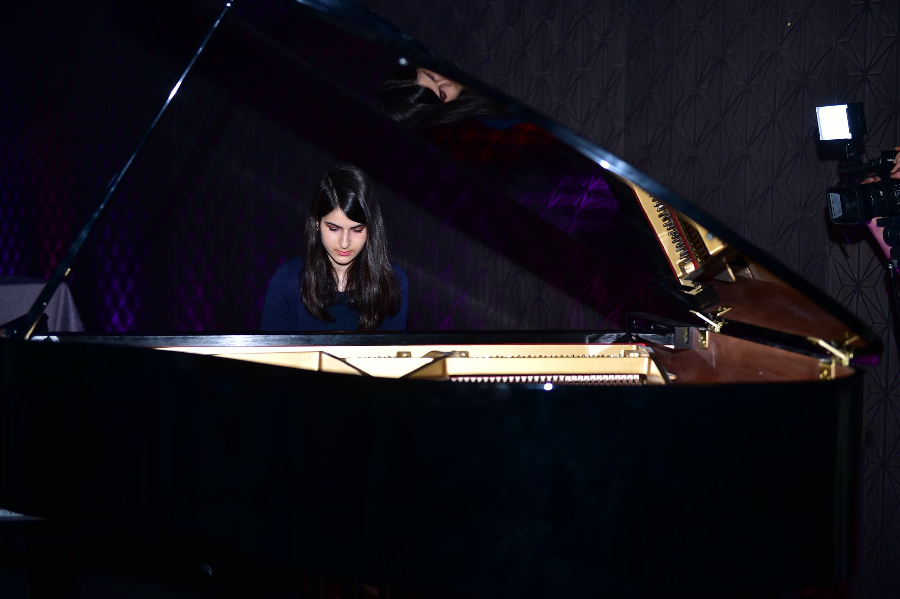 Lulwa Al Shamlan, Year 12 student and one of the youngest Inspiring Kuwaitis in our book, playing the Appassionata sonata, 3rd movement by Beethoven on the piano at the launch of Those Who Inspire Kuwait ©Those Who Inspire